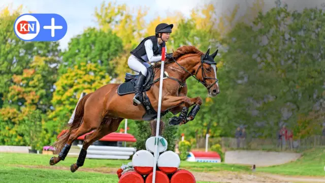 Олимпийская медалистка Джессика Эннис дает свое золото собаке